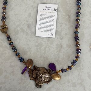 Elegant Beaded Necklace with Elephant Pendant